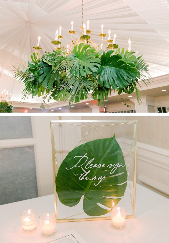 Chandelier covered in palm leaves and ferns for a Savannah wedding