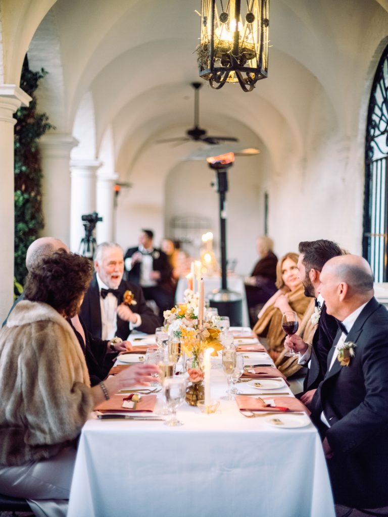 Wedding reception on the wrap-around porch of Crane Cottage