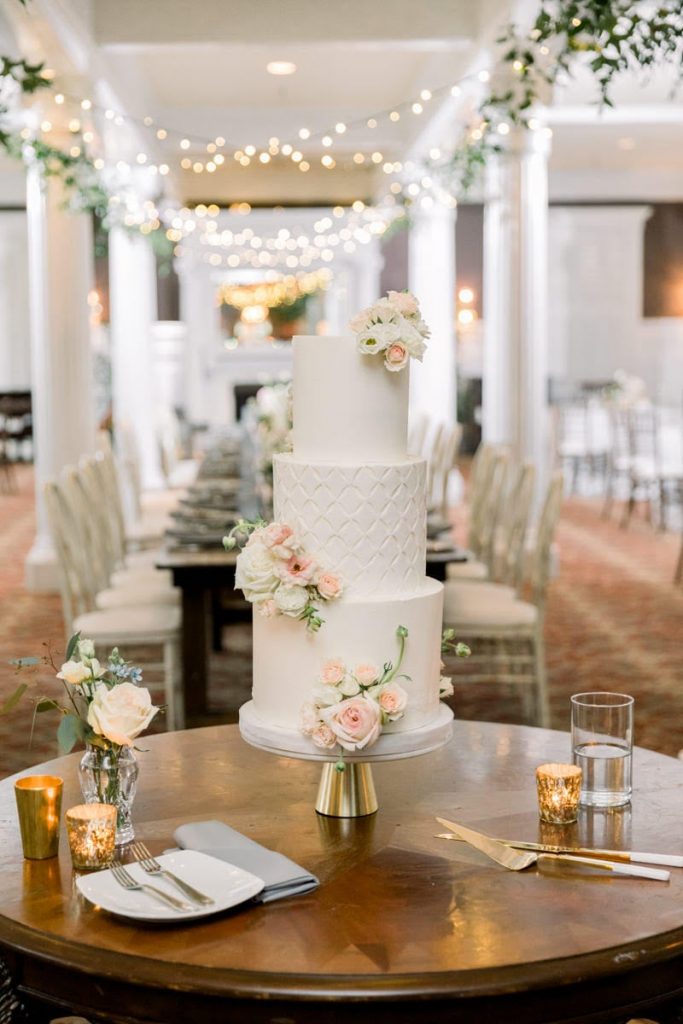 White wedding cake with flowers