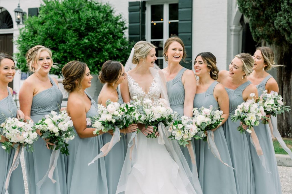 bridesmaids and white bouquets