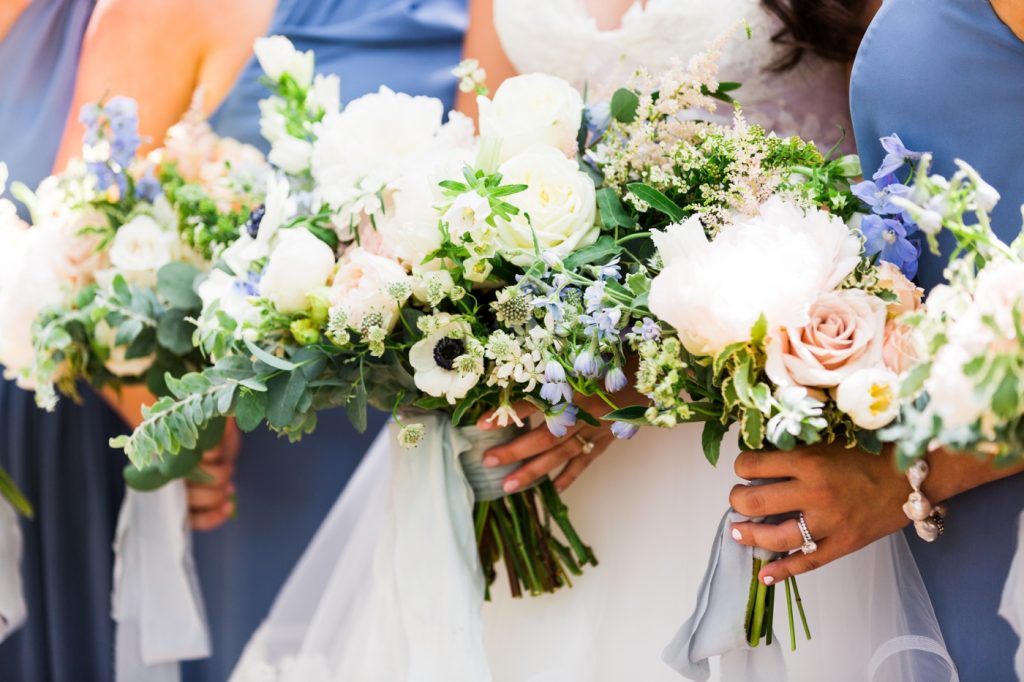 Bridesmaids bouquets with peonies, garden roses, delphinium