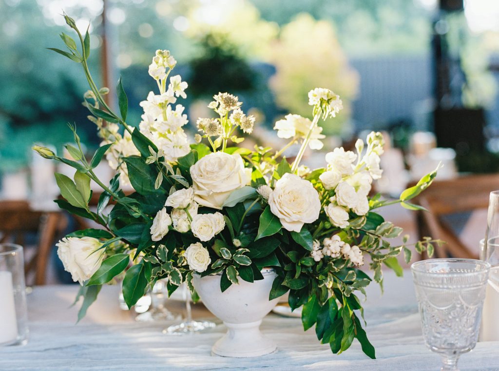 white wedding centrepiece in white vase