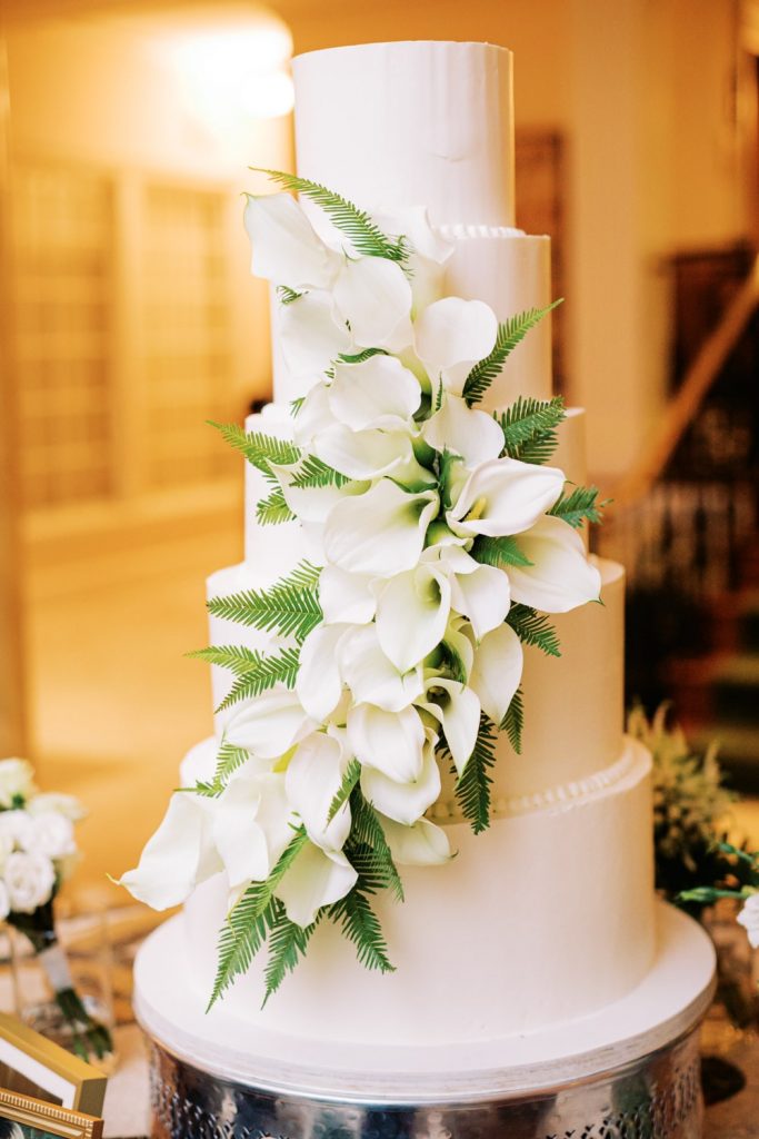 5 tiered wedding cake with white calla lilies