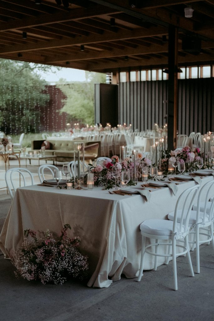 modern pink and white wedding reception decor