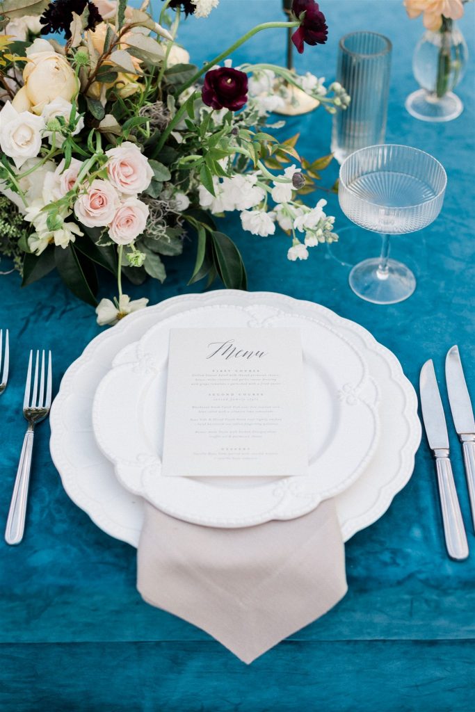 Turquoise and white wedding table decor