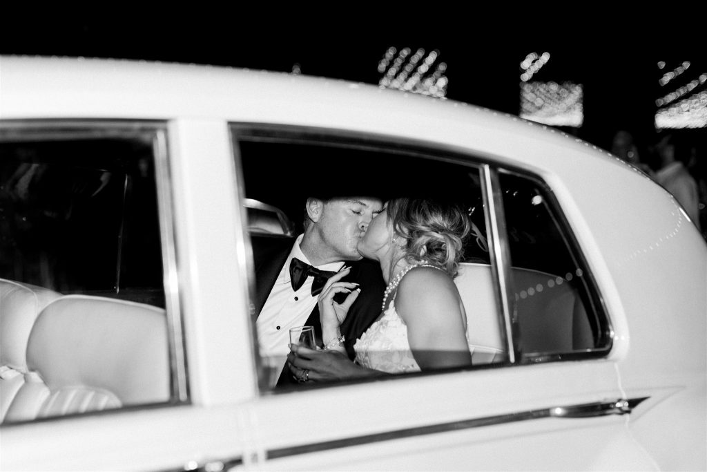 Savannah bride and groom in vintage car