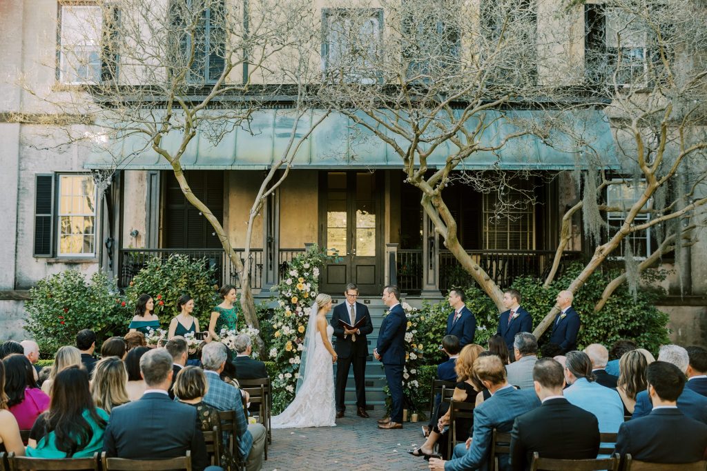 Savannah wedding ceremony with an asymmetrical wedding arch