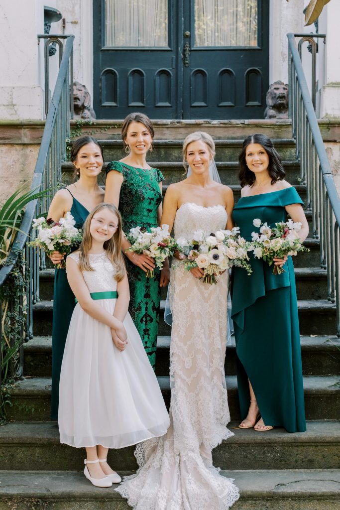 Green and white wedding party outfits
