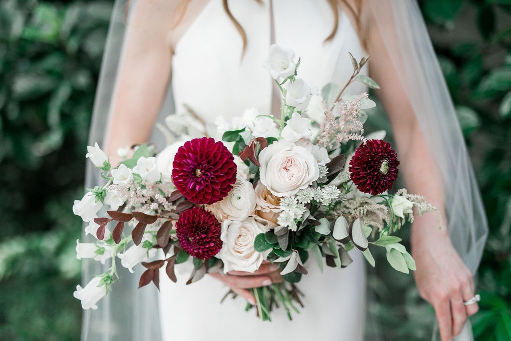 floral fall wedding bouquet with white, pink and burgundy flowers