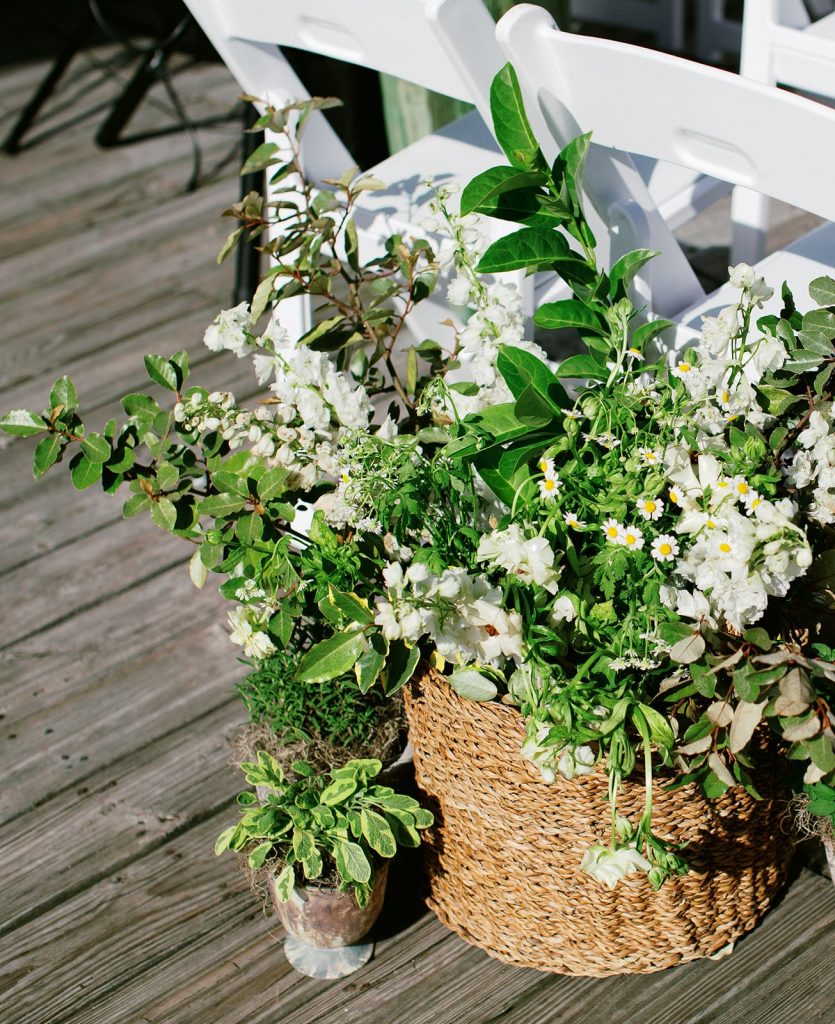 Savannah wedding ceremony flowers in basket