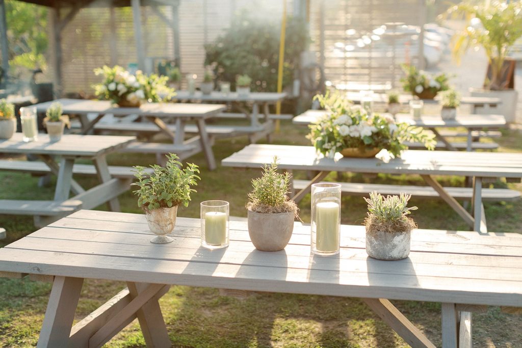 Wedding centrepieces on picnic tables