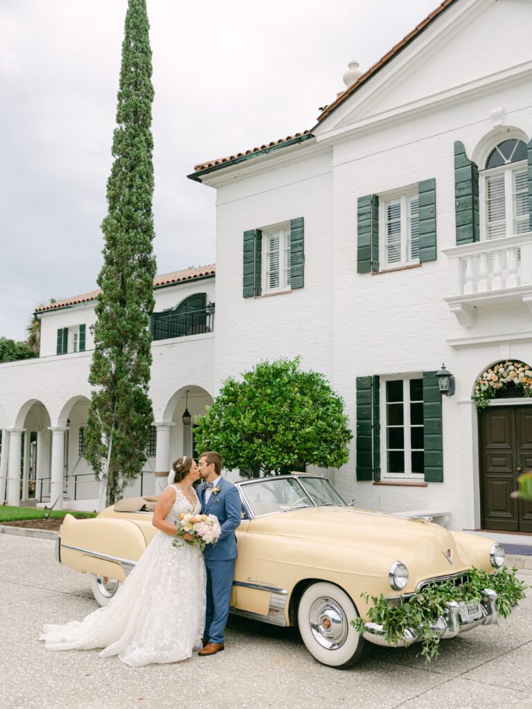 Wedding photos with vintage car at Crane Cottage wedding