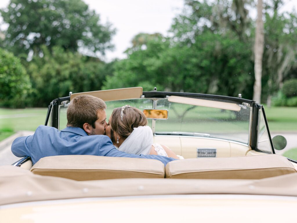 Wedding photos with vintage car at Crane Cottage wedding