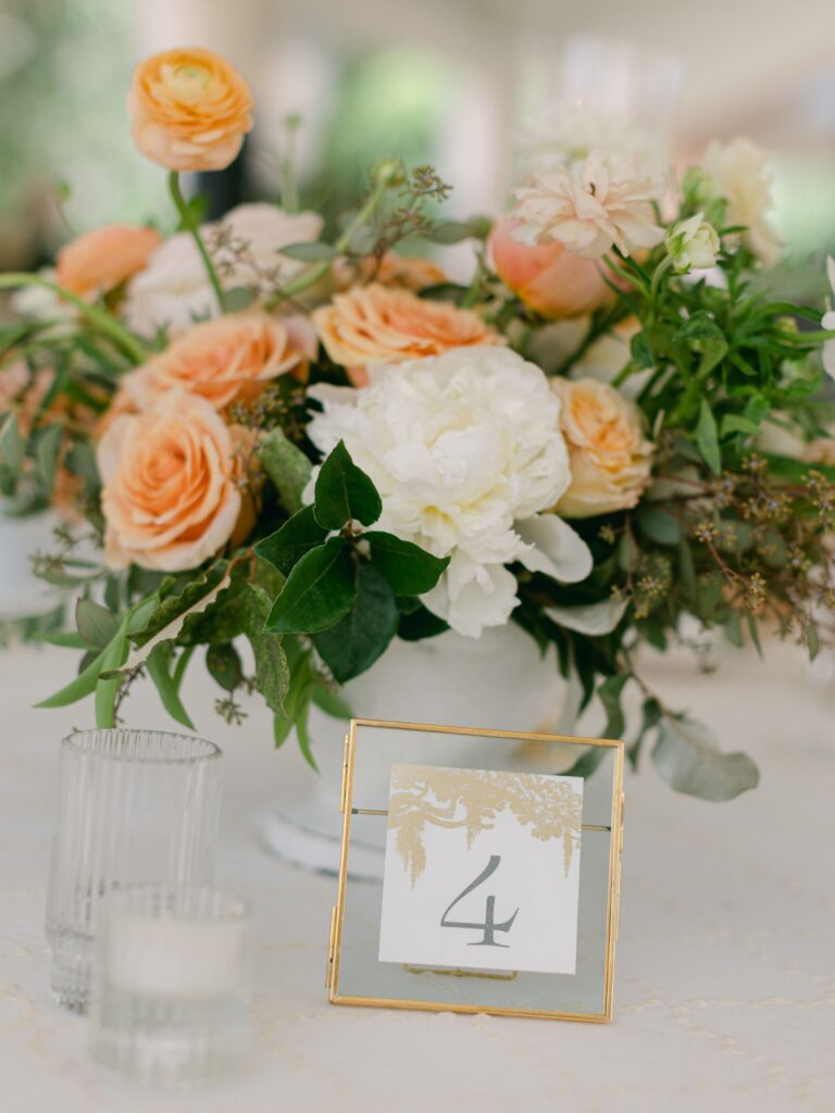 Peach & white wedding centrepiece