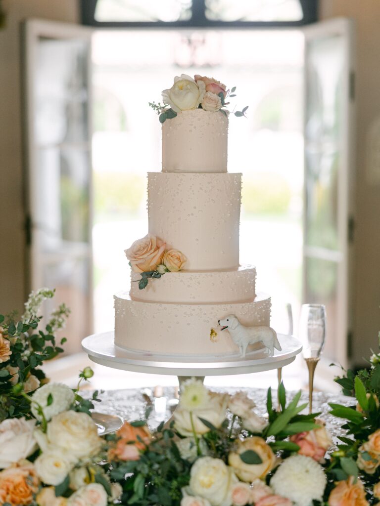 Eleant white wedding cake with peach roses