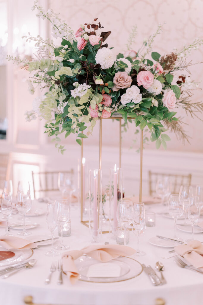 Tall floral centrepieces with gold stands