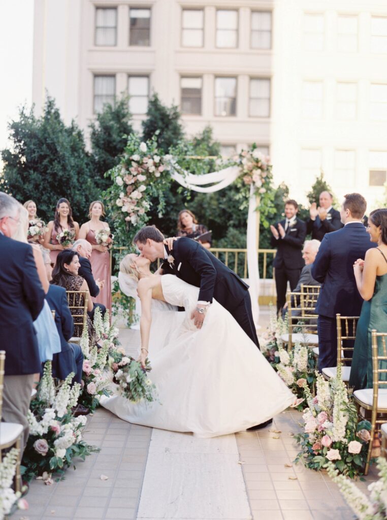 Wedding ceremony kiss