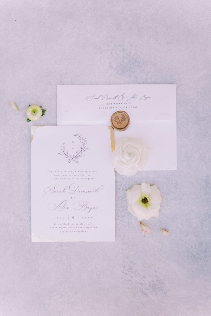 Fine art wedding invitations with gold wax seal