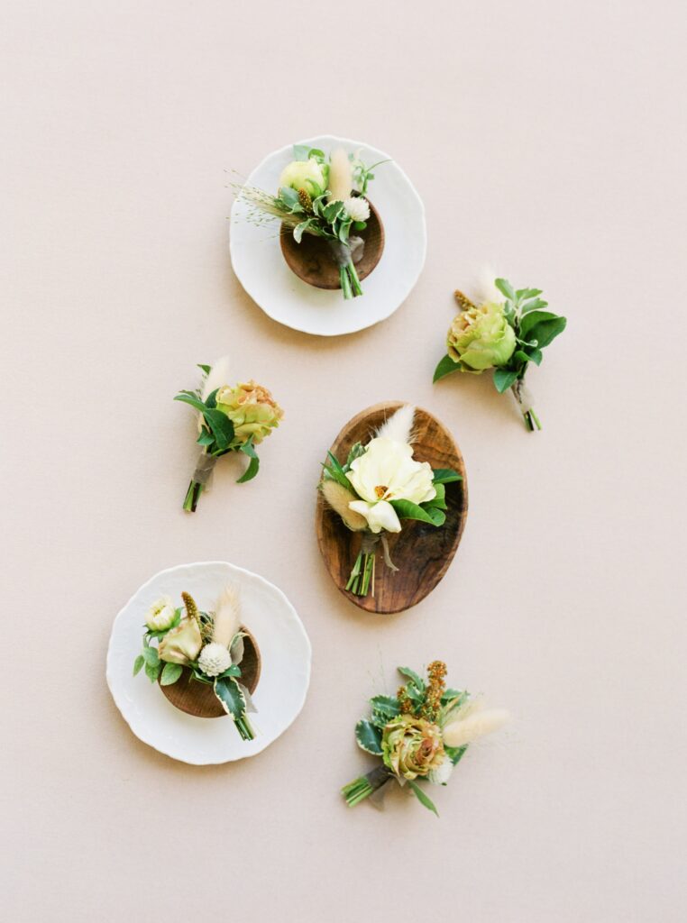 White groomsmen boutonnières 