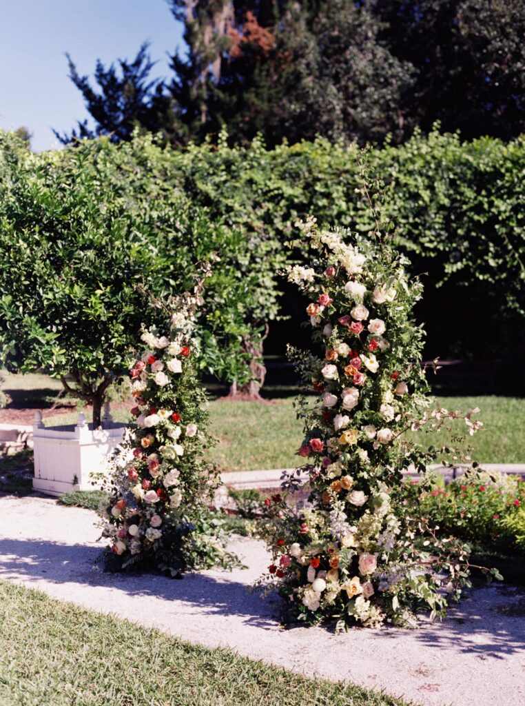 Asymmetrical floral wedding ceremony arch