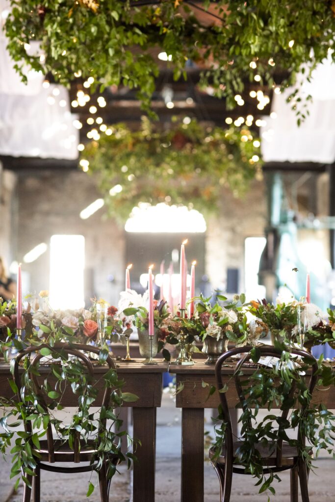 Wood head table with greenery