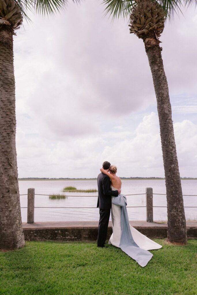 Bride and groom with palm trees