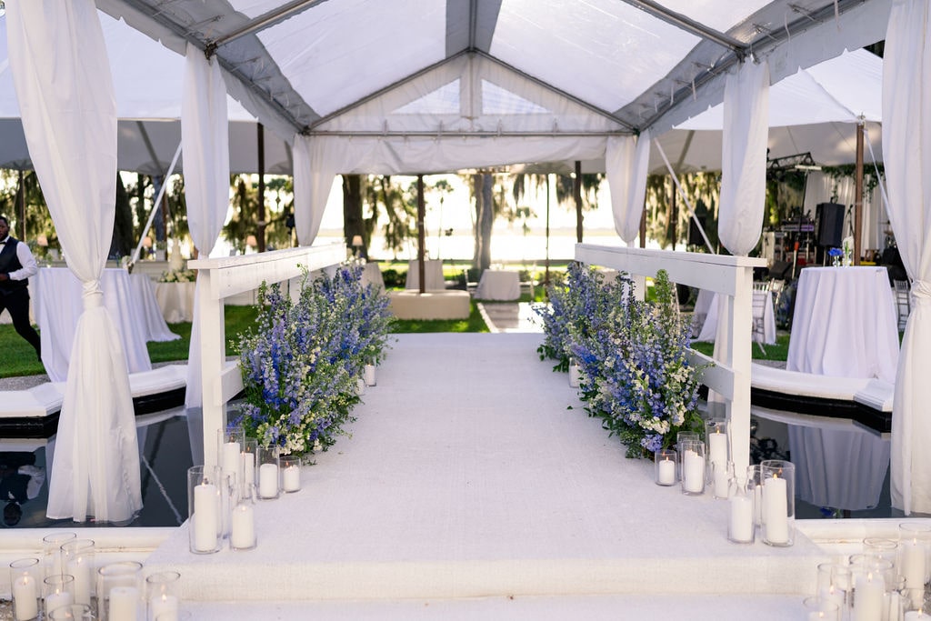 Entrance to tent with bleu flowers and candles