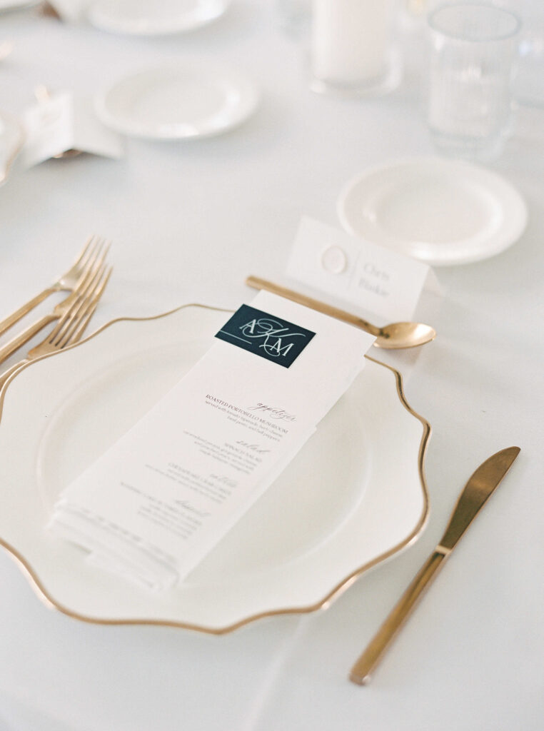 white and gold place setting