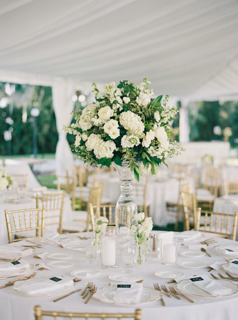 Wedding table with tall flower arrangements