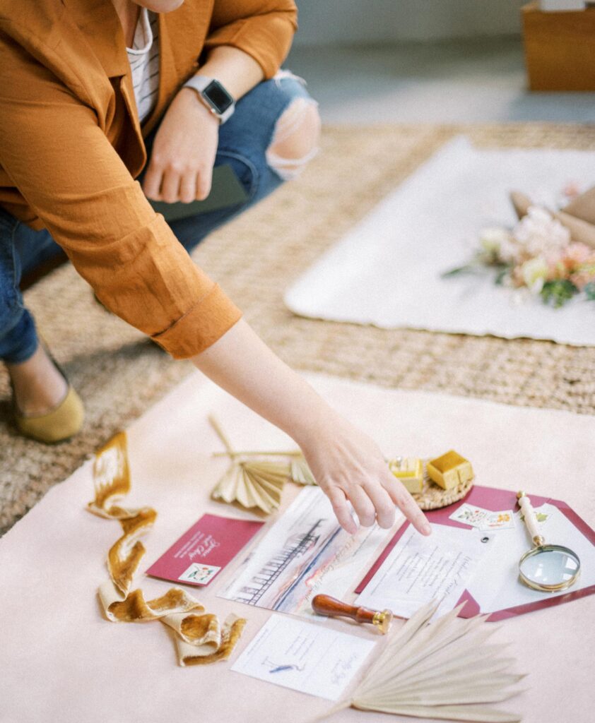 Floral Designer creating a flatlay