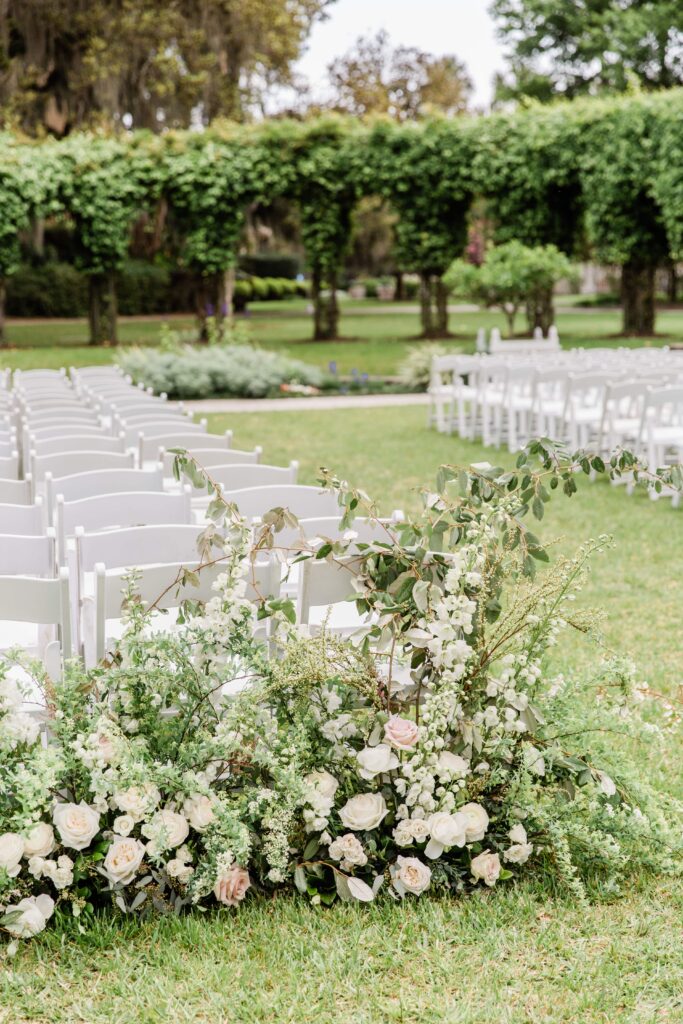 White wedding ceremony flowers