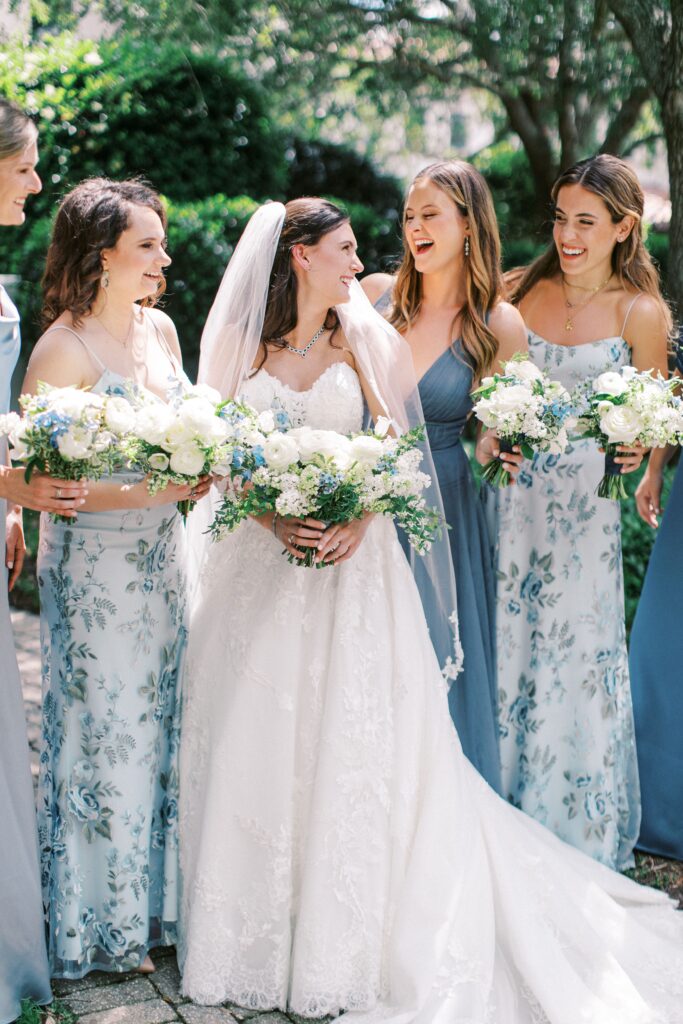 Bride with bridesmaids in blue dresses